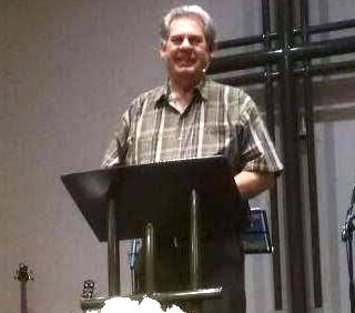 Dr Jan teaching in a South African church.